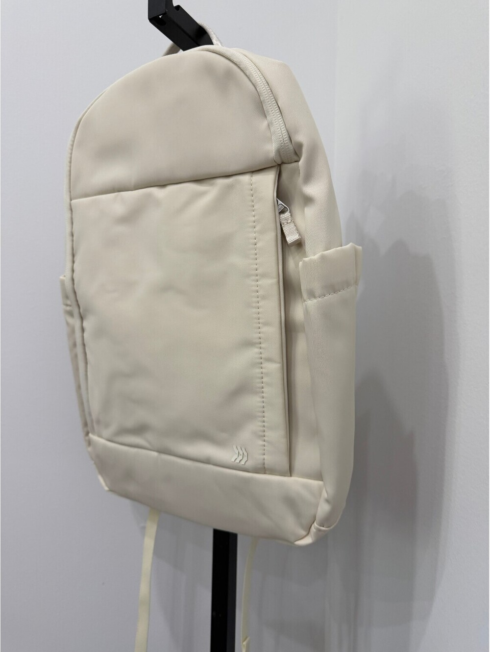 All in Motion Minimalist Cream Backpack with Side Pockets and Padded Straps - Picture 3 of 5